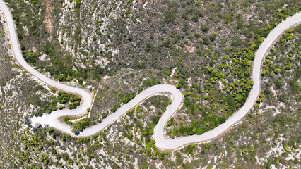 Aerial drone top down serpentine mountain scenic zig zag road with 