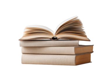 Open book resting on a stack of books