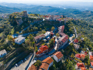 Albania traditional folk market bazaar Kruj&euml; drone roof top in blue sky