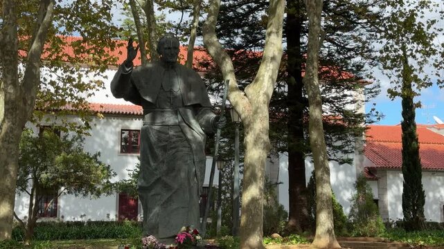 Cascais, Portugal, Pra&ccedil;a 5 de Outubro and statue of Pope John Paul II, historic square near the Cidadela Palace and seafront, architecture and cultural landmark in the coastal city