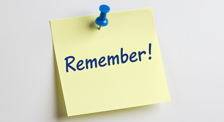 Yellow sticky note with the word remember written on it isolated on white background