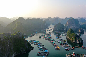 Aerial Drone View of Floating Fishing Village and Aquaculture Durng Golden Hour — Vietnam © Ken