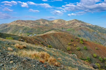 A wide-angle view of dry, rugged Zagros foothills in Kurdistan