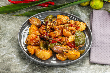 Potato with bell pepper and gravy