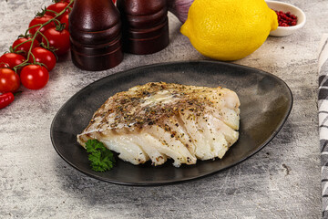 Baked cod fish fillet with spices