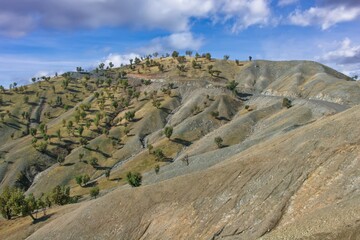 A wide-angle view of dry, rugged Zagros foothills in Kurdistan