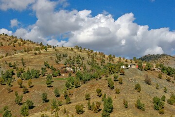 A wide-angle view of dry, rugged Zagros foothills in Kurdistan
