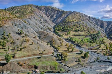 A wide-angle view of dry, rugged Zagros foothills in Kurdistan