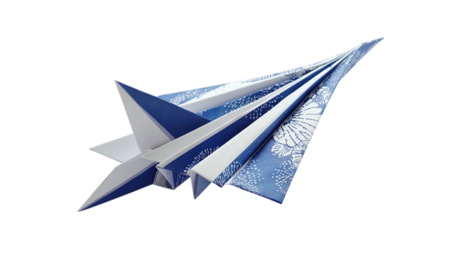 PNG of A close-up of beautifully crafted blue and white paper airplanes, showcasing artistic designs and sharp geometric lines.