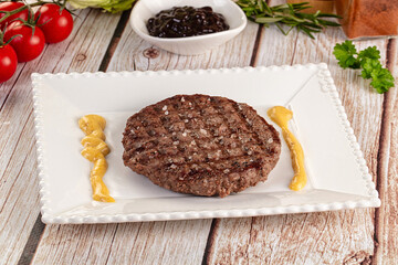 Grilled juicy beef cutlet for burger