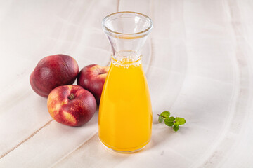 Vitamin beverage - peach juice glass
