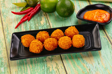 Fried crispy yellow cheese balls