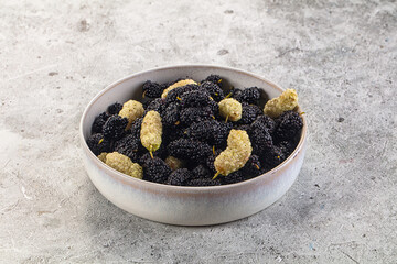 Ripe sweet juicy black and white mullberry