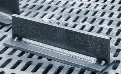 welding seam onto steel metal Industrial steel welder in factory