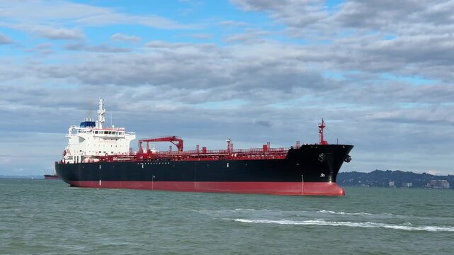 Oil tanker ship transporting fuel across sea route. Global logistics, maritime industry, international trade, oil and gas sector, transportation and infrastructure.