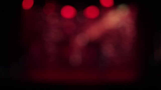 Blur defocus texture, background for design. Singers and musicians perform on scene.
