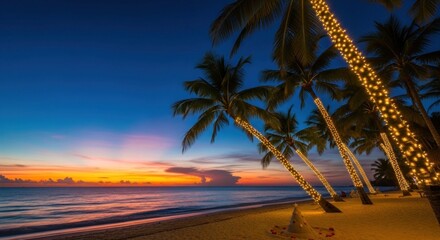 Tropical beach at sunset with illuminated palms, ocean backdrop