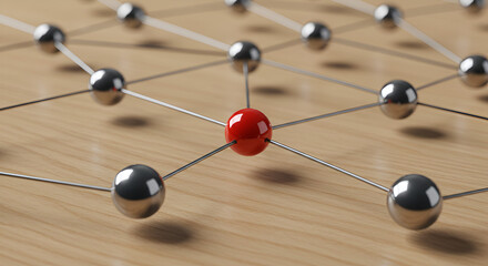 Dynamic network of interconnected spheres symbolizing communication, data flow, and complex systems on a wooden surface