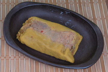 Tamal Typical Colombian Food Wrapped in Banana Leaves