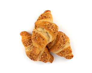 Delicious croissant with nut crumbs, sweet French bakery