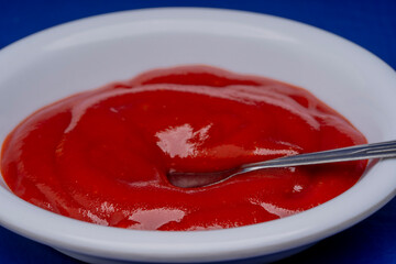 delicious tomato sauce in a white bowl