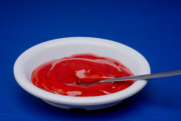 delicious tomato sauce in a white bowl