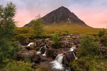 Waterfalls in Scottish highlands of Glencoe with Buachaille Etive M&oacute;r mountain in Ballachulish, UK