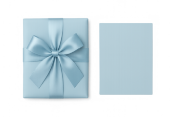 Light blue gift box with satin ribbon bow and accompanying blank card, top view for celebrations and events