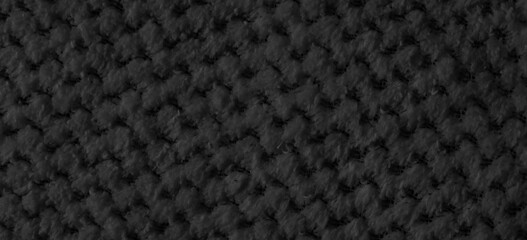 black braided material with an interesting pattern