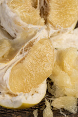 soft juicy flesh of grapefruit, sweet fresh grapefruit peeled from the yellow thick peel