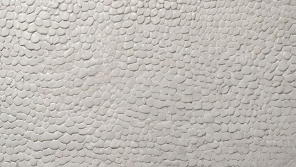 White pebble stone texture background with pattern. Natural smooth rock surface ideal for spa wellness design, architectural rendering, bathroom flooring, outdoor garden path, minimalist wallpapers.