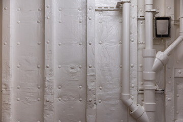 Inside Ship Insulation and Pipes &ndash; Industrial Marine Background Texture