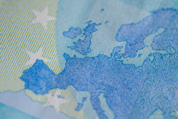Details of the blue twenty euro banknote of the European Union , part of the genuine 20 euro blue banknote, close up