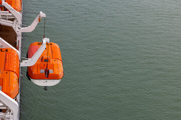 Rescue Boat Being Lowered During Emergency Operation at Sea
