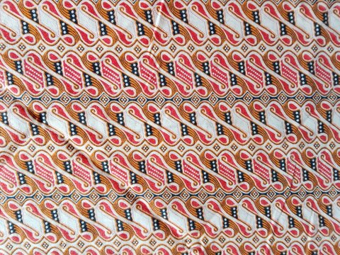 The parang batik motif appears abstract, with repeating patterns resembling geometric shapes. It's a traditional Indonesian motif.