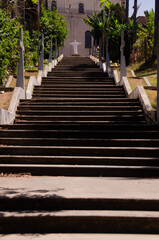 staircase in the santa olimpia neighborhood, in piracicaba, with the Maria Estrela da evangeliza&ccedil;&atilde;o Parish in the background
