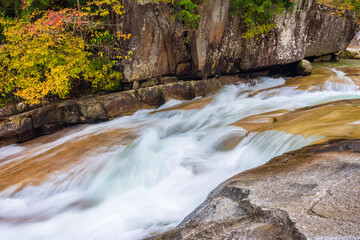 waterfall in autumn forest