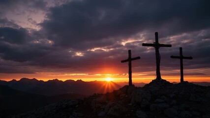 Three crosses silhouetted on a mountain at sunset. The crucifixion of Jesus Christ on a rocky peak. Christianity, faith, and resurrection concept for Easter - Powered by Adobe