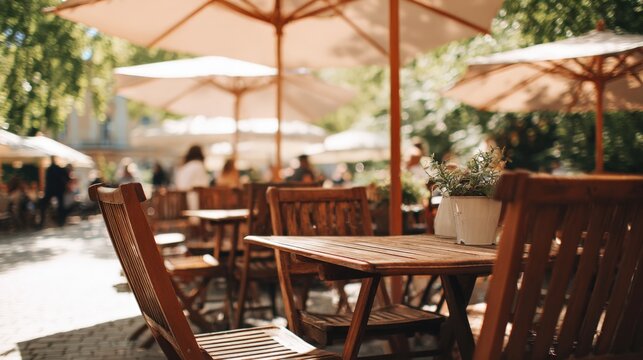 Inviting Outdoor Cafe Seating Area with Wooden Tables, Chairs, and Parasols on a Sunny Day