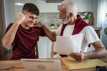 Grandfather celebrating grandson's success with good news
