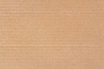 Cardboard sheet texture background, detail of recycle brown paper box pattern.