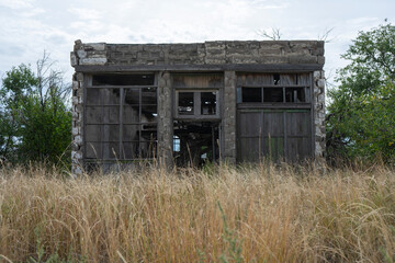 An old run-down building in a tiny town out west