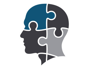 Profile of a human head made of puzzle pieces