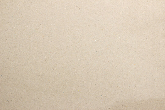 Old paper vintage texture surface for background. Recycle pale brown paper texture, Cream color recycled kraft paper texture blank with copy space for text.