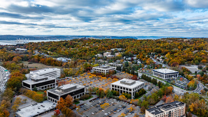 Autumn aerial image of a non-descript business, corporate park, with parking, location in the north eastern United States.