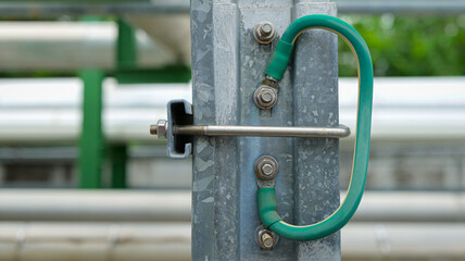 Ground bonding connects cable tray junctions in an industrial plant, preventing sparks from static electricity