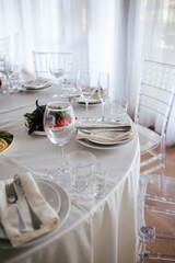 Elegant Table Setting with Glassware and Napkins