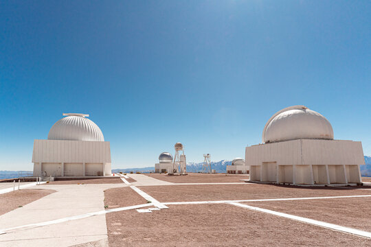 Astronomical observatory under clear blue sky in Cerro Tololo, northern Chile