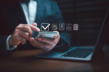 Businessman using smartphone for digital document management and online approval process. Concept...