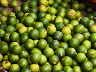 Fresh Key Limes Abundance Vibrant Green Citrus Fruits Display Market